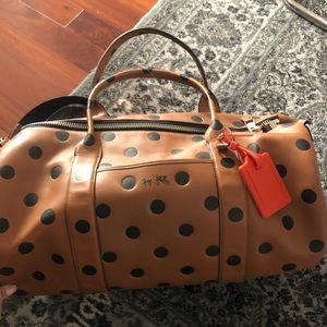 Coach barrel / duffel bag saddle dot embossed